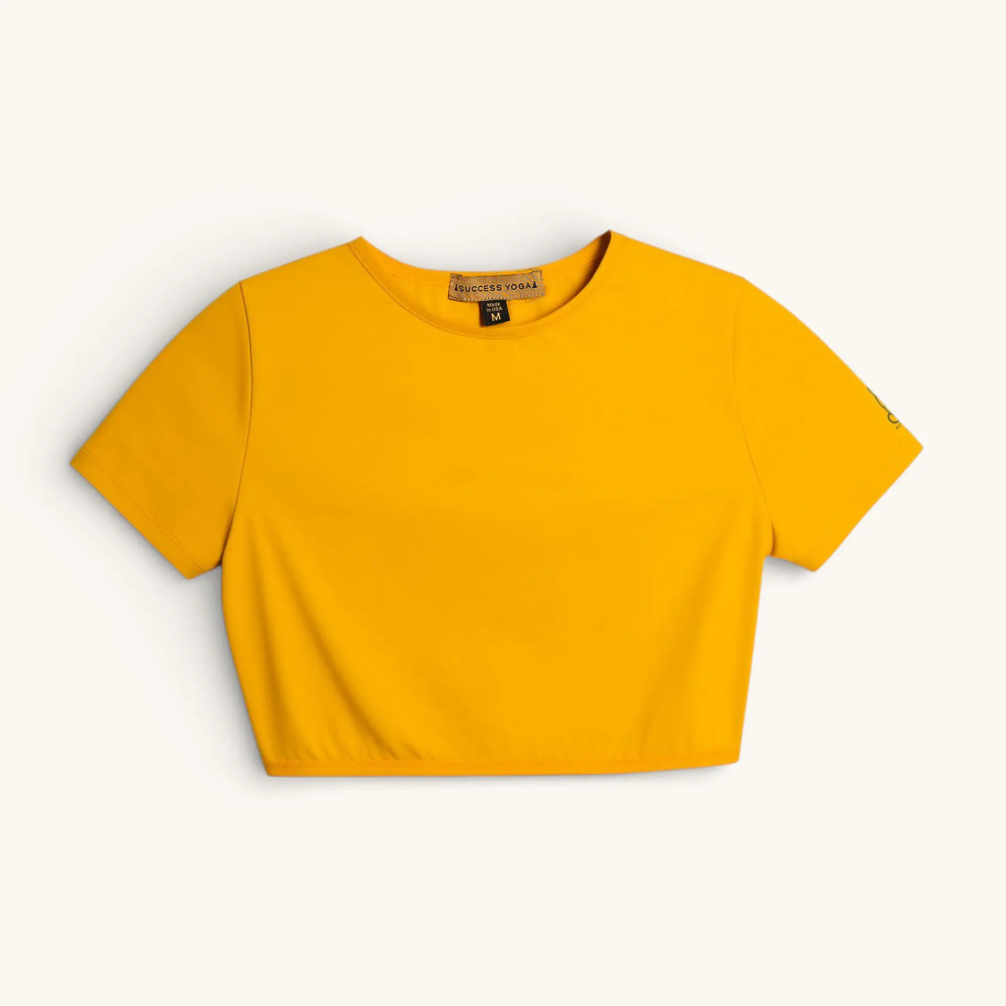 Bright mustard T-shirt with Success Yoga label