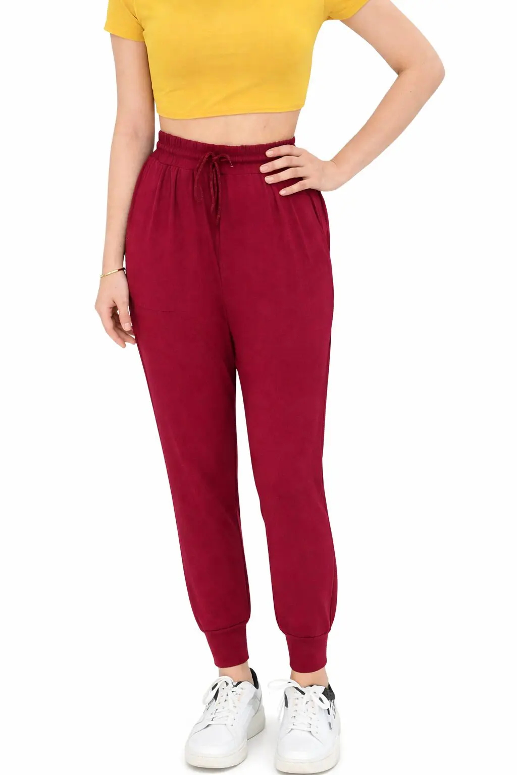 Red jogger pants with an elastic waistband and ankle cuffs.